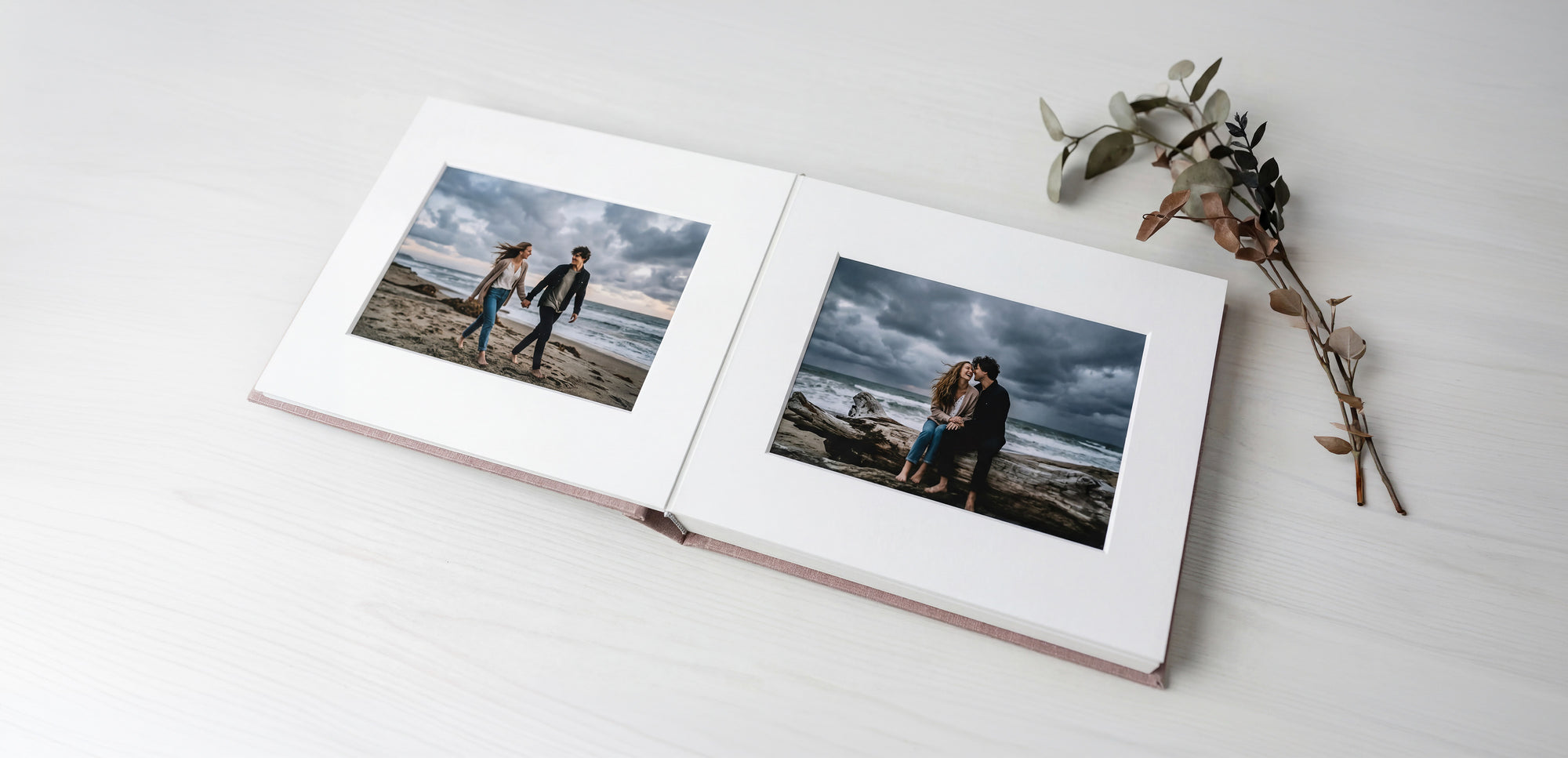 An album with photographs framed by archival mats