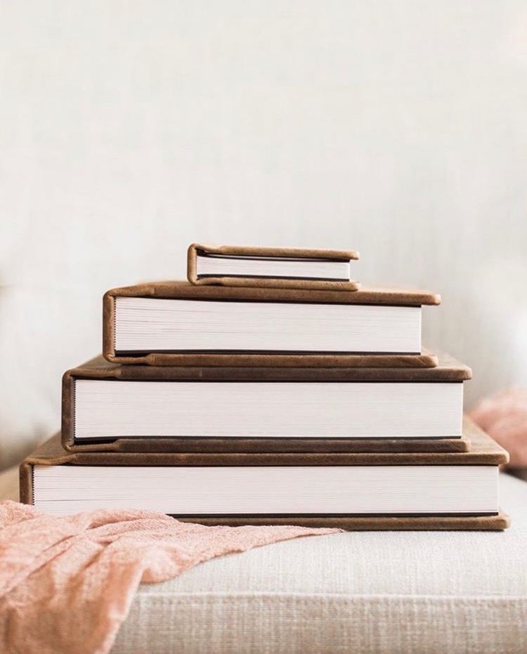 A stack of albums in different sizes
